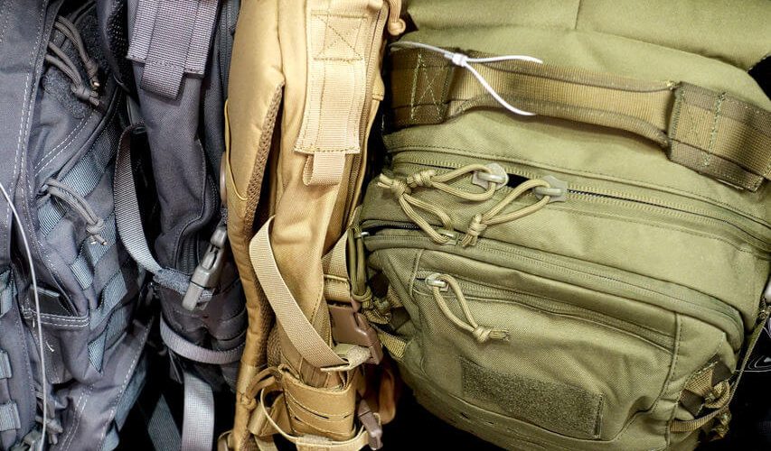 multicolored tactical military backpacks and messenger bags
