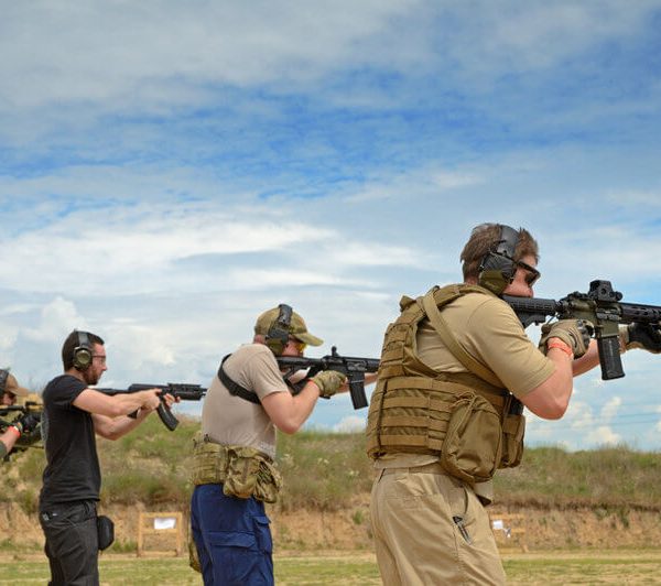 men training in shooting range