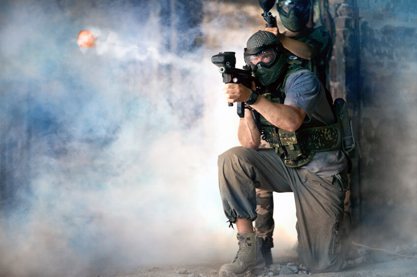 paintball team practicing shooting in the paintball game