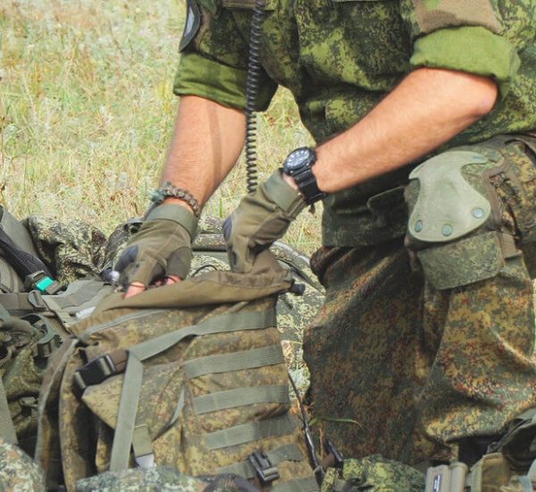 person using army bag