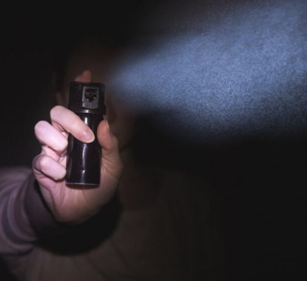 person using pepper spray