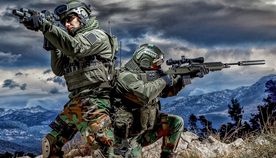 two airsoft players in position